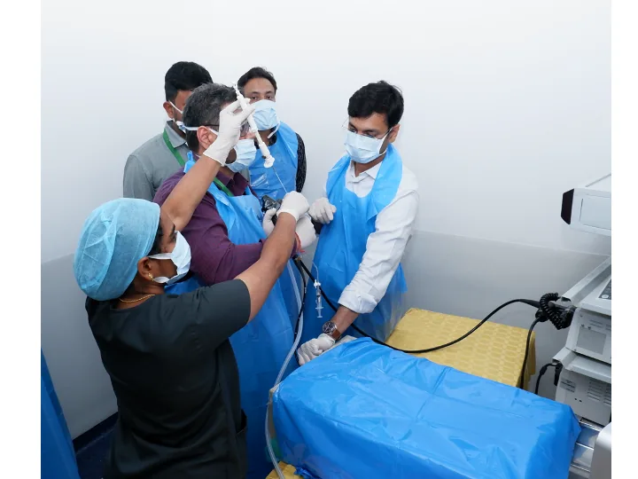 Dr. Arun Gangadhar demonstrating linear EBUS bronchoscopy at a hands-on training workshop